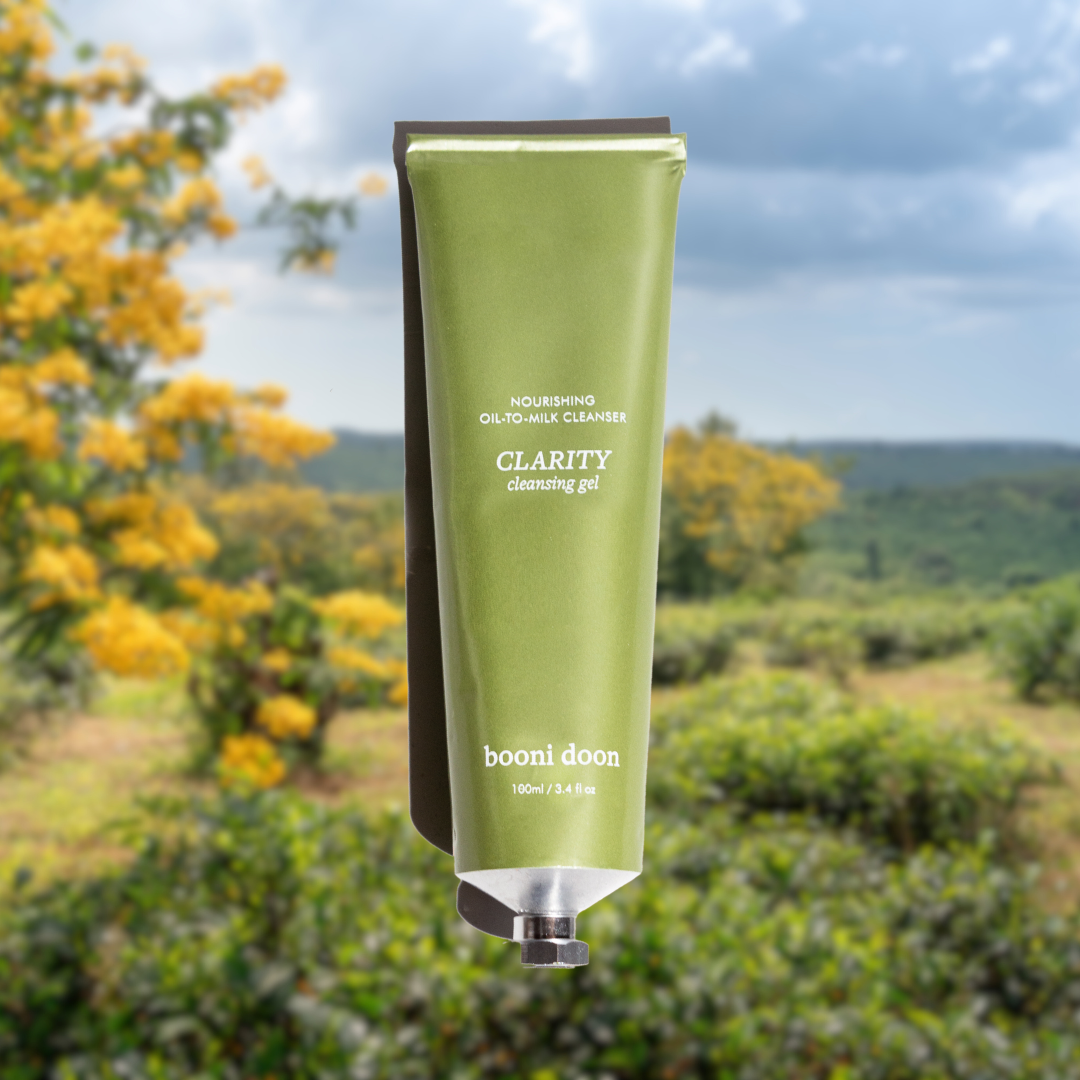 Image of booni doon's CLARITY Cleansing Gel on blurred landscape background