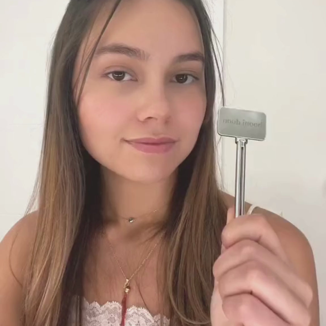 Video of woman using booni doon's COMFORT Tube Key